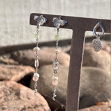 Divine øreringe i sølv med blad og ædelstene