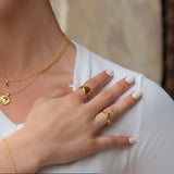 Glow ring i 18 karat guldbelagt sølv med blå topas, diamant, smaragd, ferskvandsperle og pink turmalin