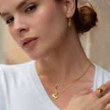 Glow halskæde i 18 karat guldbelagt sølv med pink turmalin og diamant