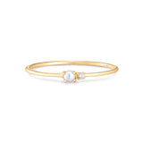 Fine ring i 14 kt guld med diamant og ferskvandsperle