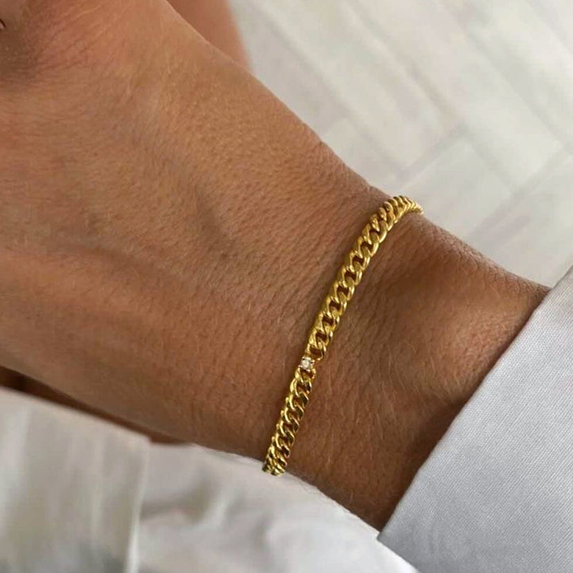 Infinity armbånd i 18 karat guldbelagt sølv med brillantslebet diamant